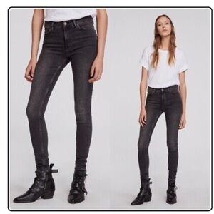 Dark grey All Saints jeans.